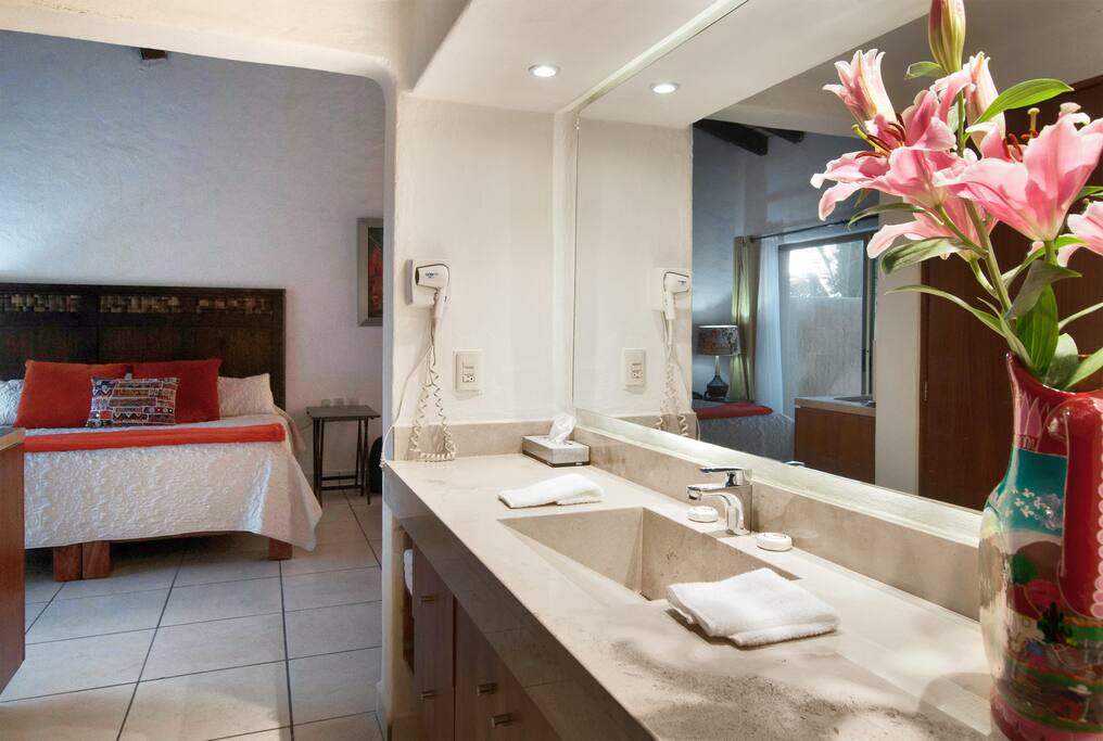 Marble topped countertop, new plumbing fixtures, led lights and cabinets