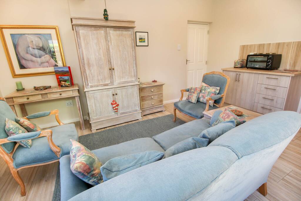 Comfy living room (stocked with magazines, brochures, board games, DVDs, books)