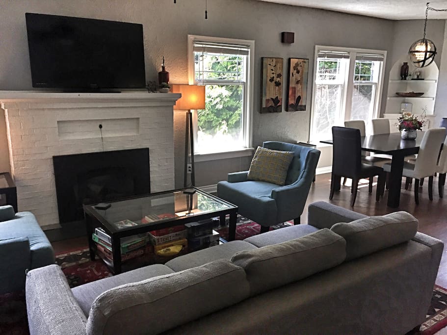 Cozy living room with gas fireplace. The couch pulls into a comfortable bed.