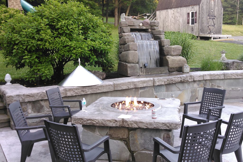 Large patio with gas fire pit and waterfall. For your enjoyment.