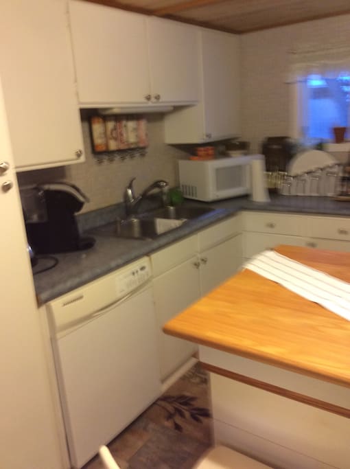 Full kitchen amenities, stove , microwave, fridge, dishwasher, coffee maker,