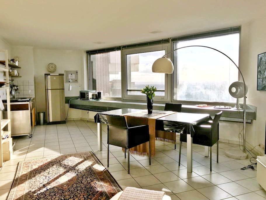 The large 6 m wide windows brightly lighten up the studio and ...