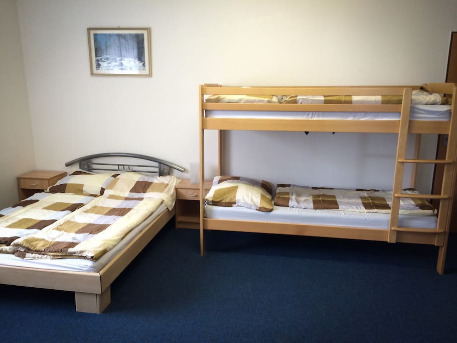 A double bed and a bunk bed.