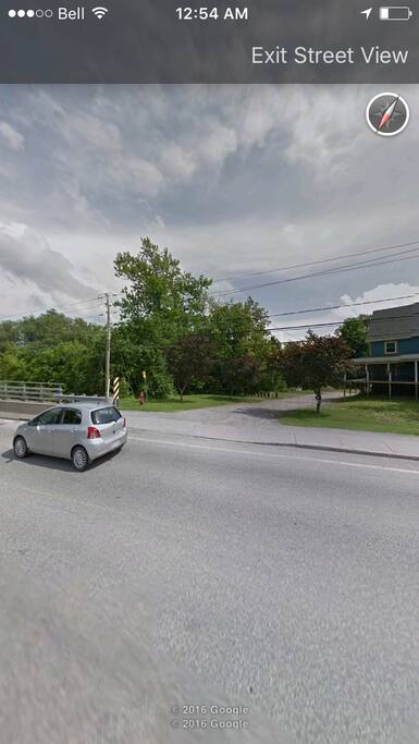 Turn right onto the driveway. You may park perpendicular to the riverbank.