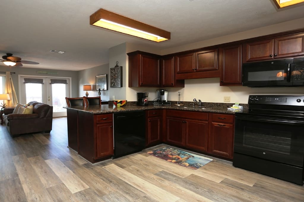Kitchen with granite counters and custom cabinets