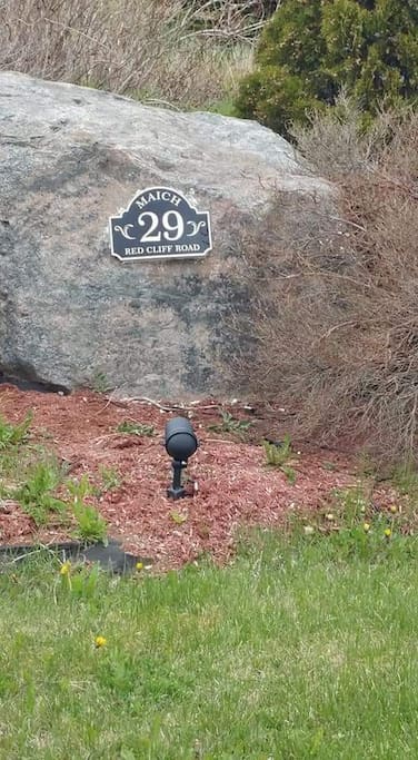 You can't see the house from the road so look for this rock on the left as you drive up Red Cliff Road.