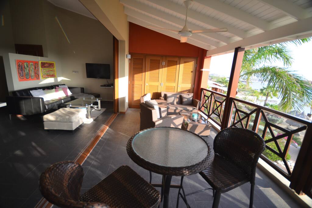 Enjoy the view of the pool, beach and Spanish Water Bay, and gentle breezes