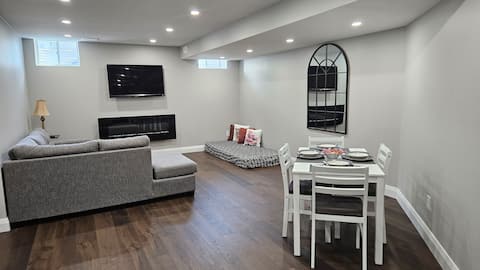 Modern 1 bedroom apt with fireplace by the lake.
