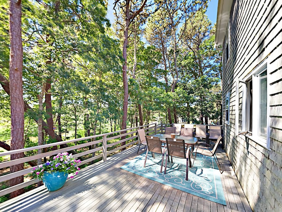 Spend peaceful afternoons on the deck overlooking the woods and scenic pond.