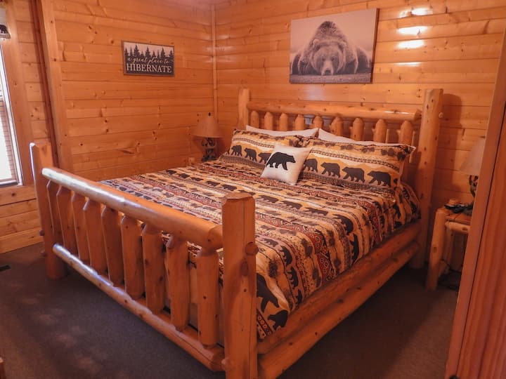 King-sized bed in downstairs bedroom.