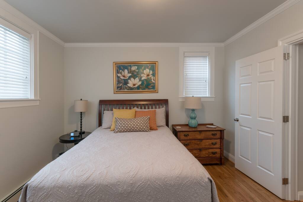 Very cozy bed with LOTS of pillows.