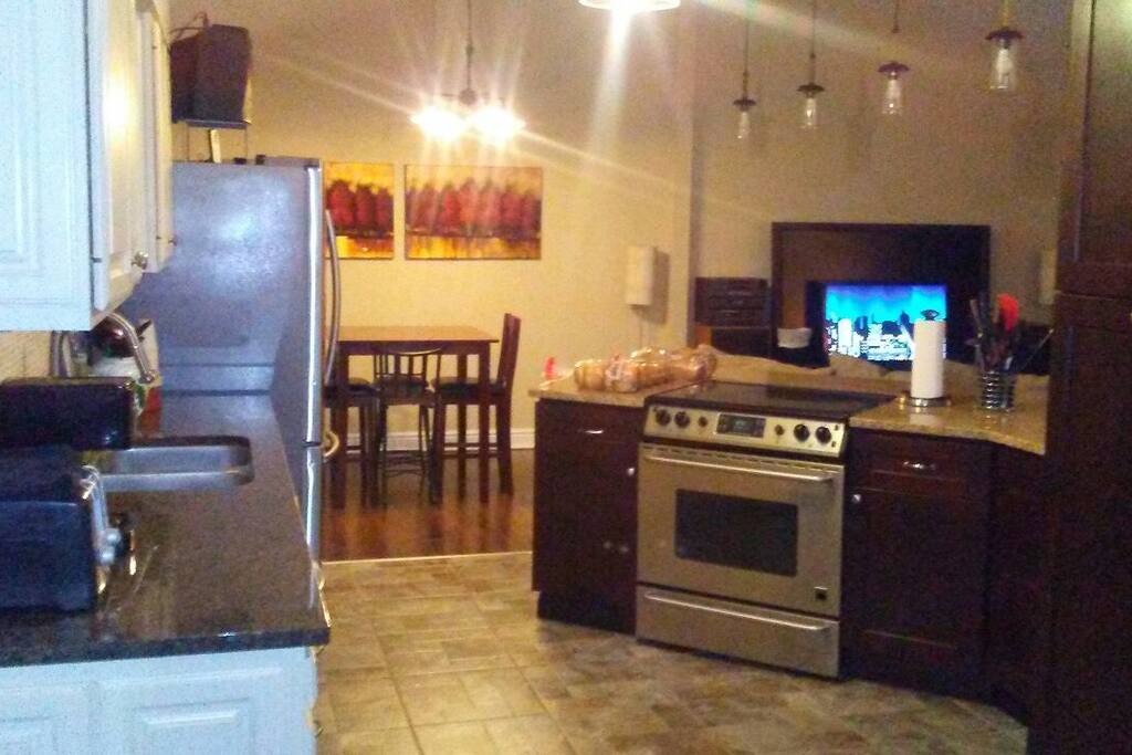 open kitchen, dining, family area