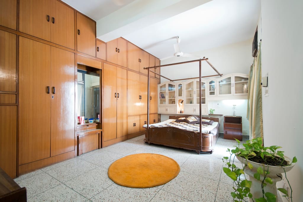 Spacious bedroom 1. Ample space for storage and entrance to a huge balcony.