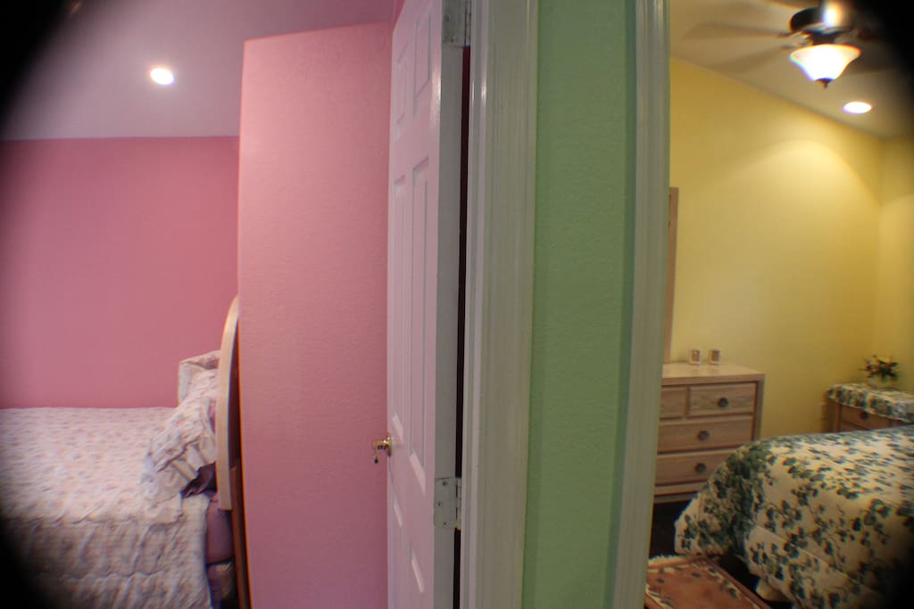 You can see the entrance to both bedrooms