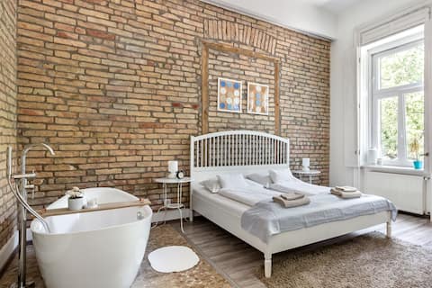 Relax into Loft-Style Living at a Grand Urban Sanctuary