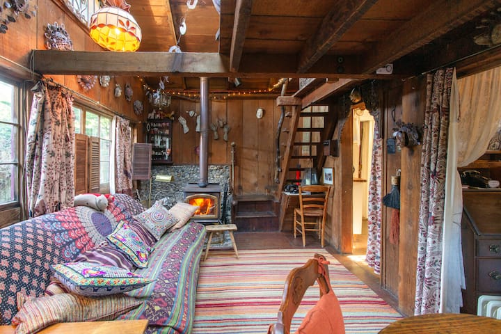 Coming in from the front athe showing stairs going up to the loft area