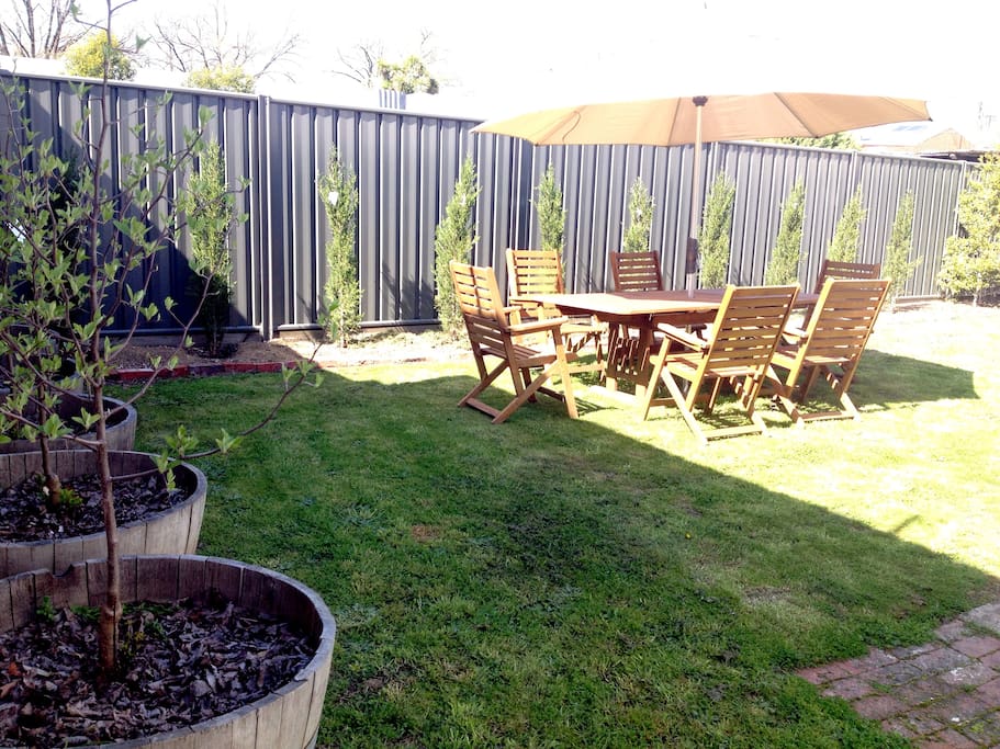 fenced yard and BBQ area. Garden shed for bikes, dog etc