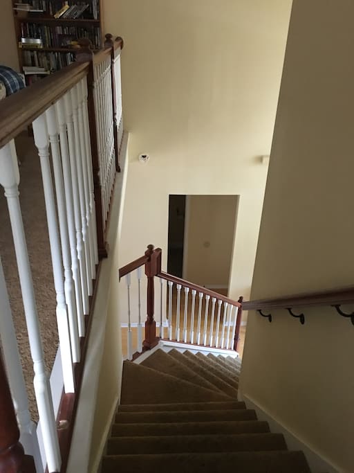 Stairs to access both bedrooms and loft.