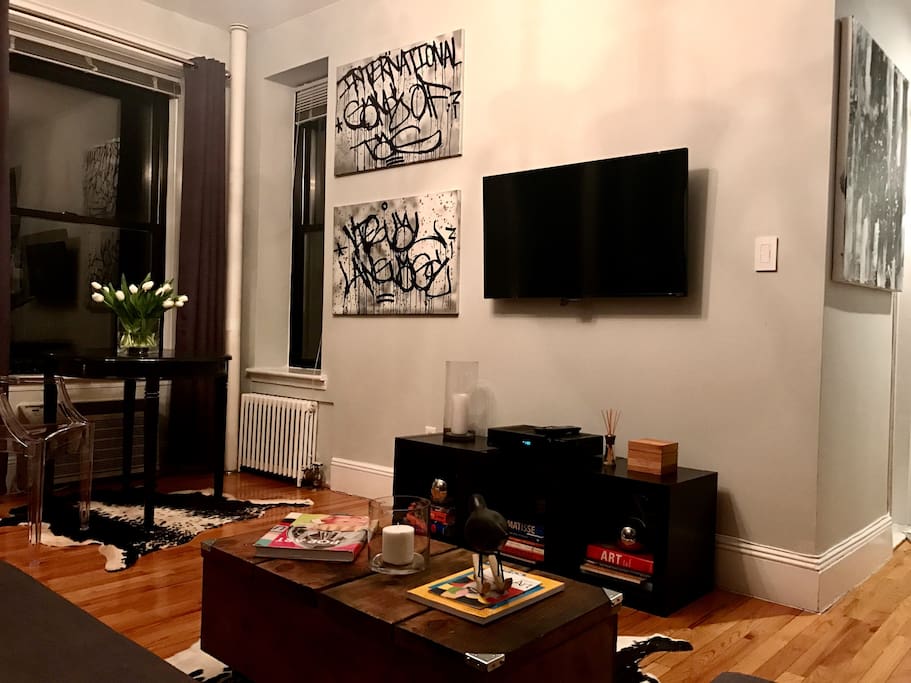 Large wall mounted TV with Netflix - Cable and WiFi.