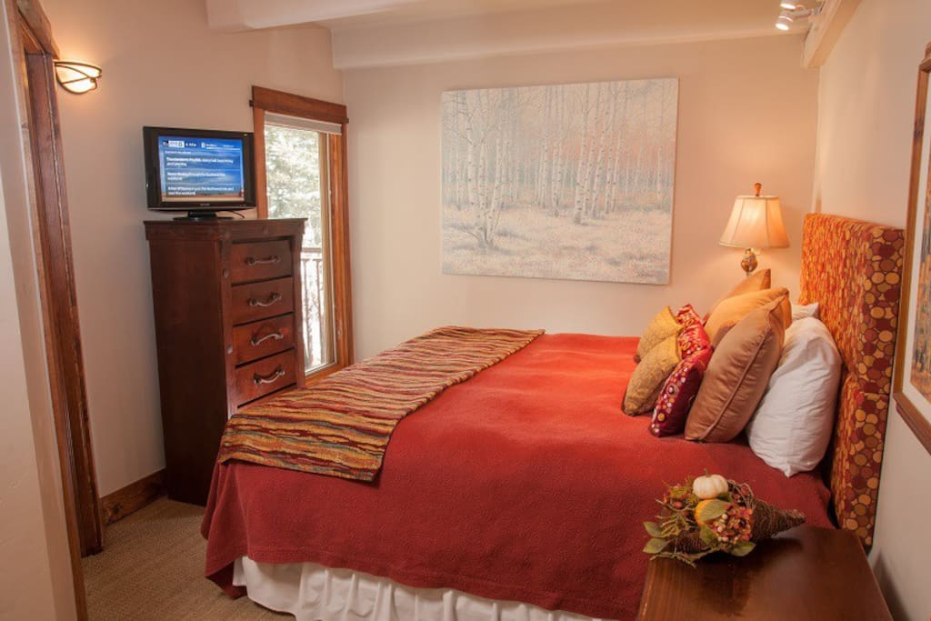 Sink into the comfortable bed in the master bedroom.