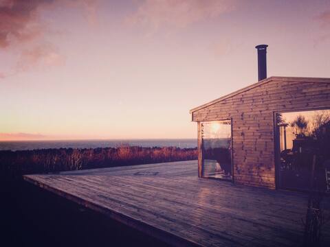 Nestled in nature with uninterrupted ocean views
