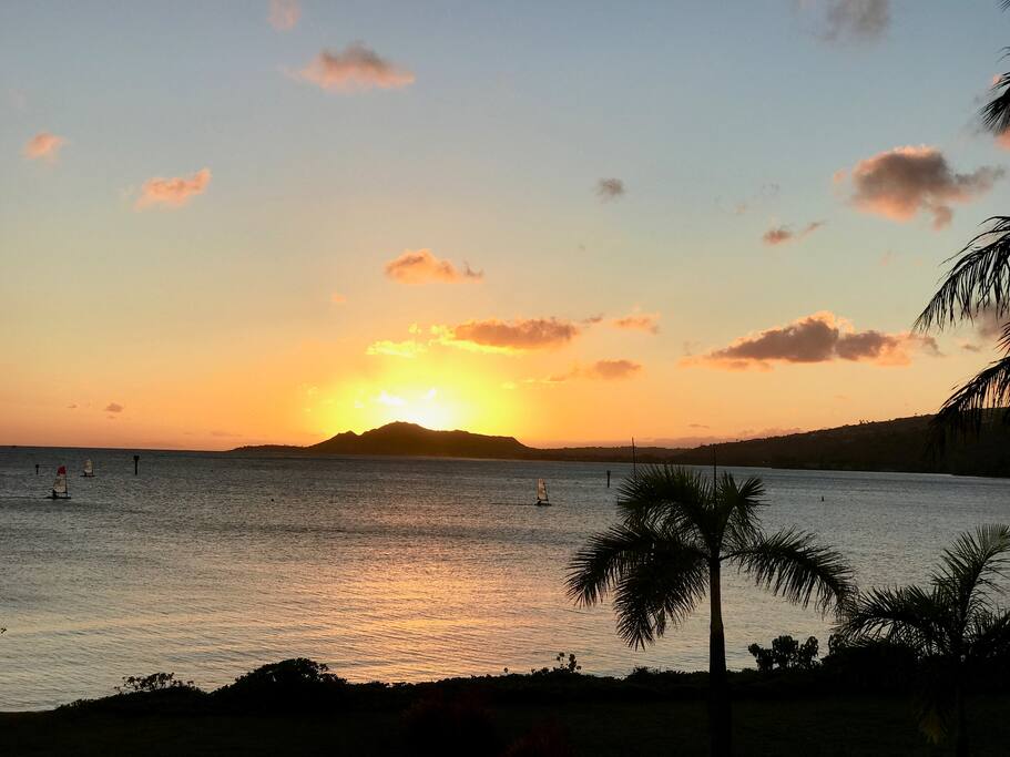 Enjoy gorgeous sunsets over Diamond Head right on your beach!