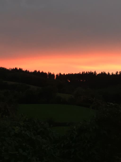 October evening. View of Huntley Hill from back of the Log Cabin.