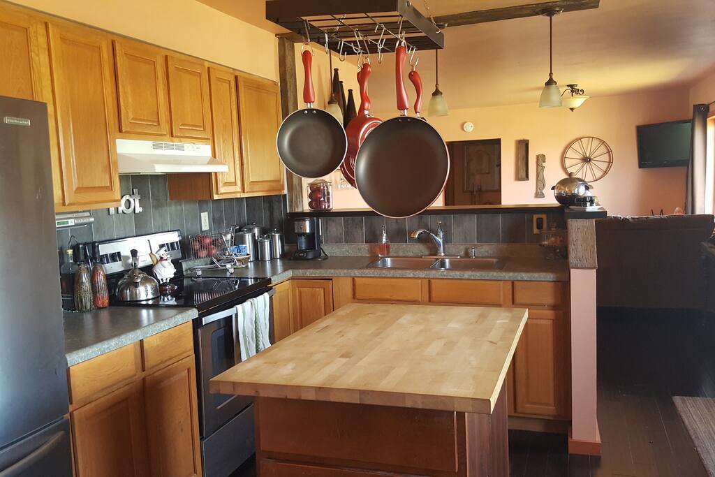 The beautiful kitchen with Island and all new appliances.