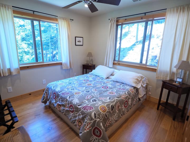 The other guest bedroom with a queen bed