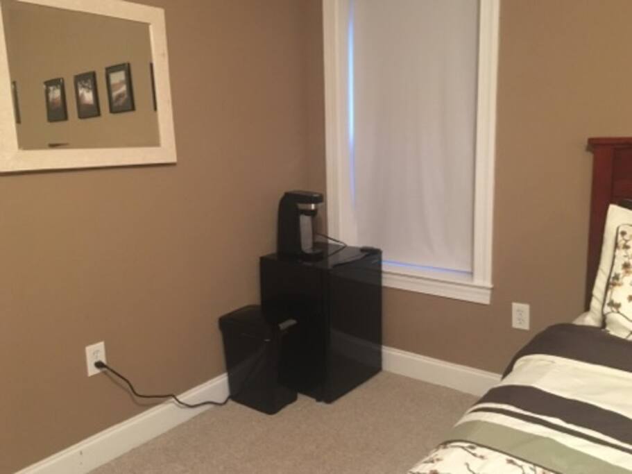 Mini-fridge and coffee make - water and coffee pods included with your stay.