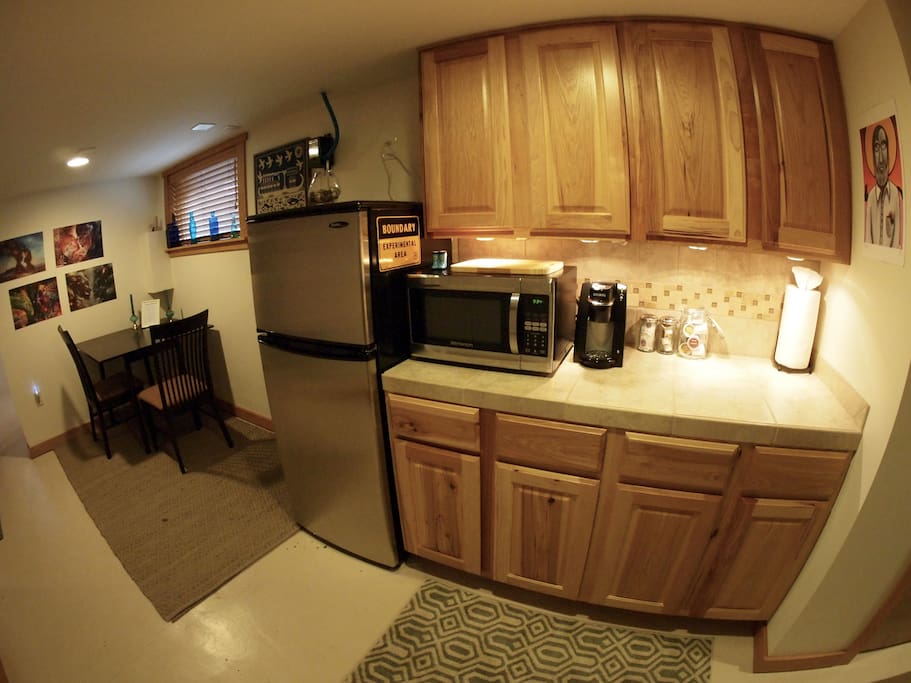 Kitchenette, more appliances in cupboards.