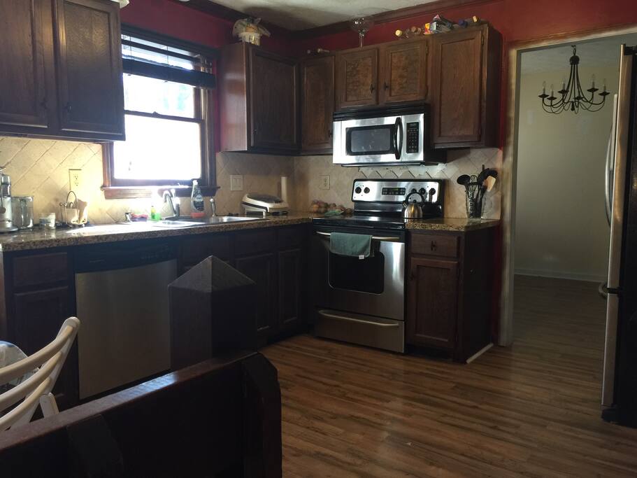 Nice open kitchen with easy to use big french door refrigerator