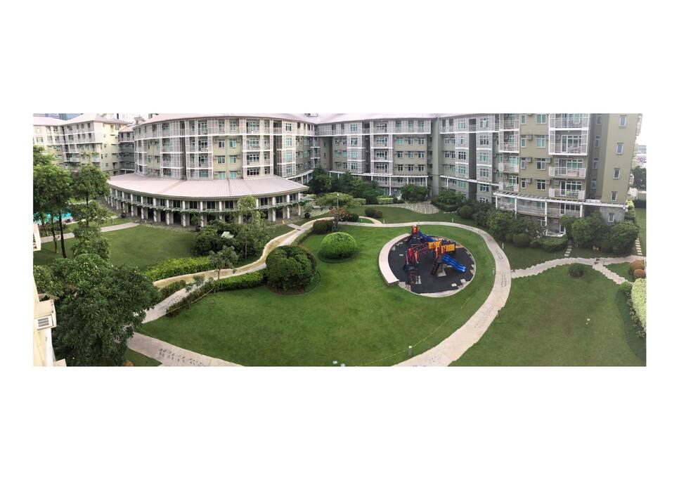 Playground and swimming pool as viewed from porch