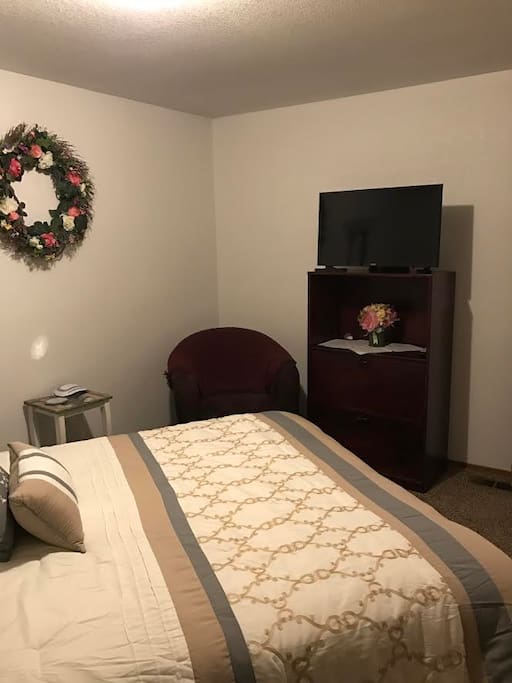 Guest bedroom with TV in 2nd bedroom.