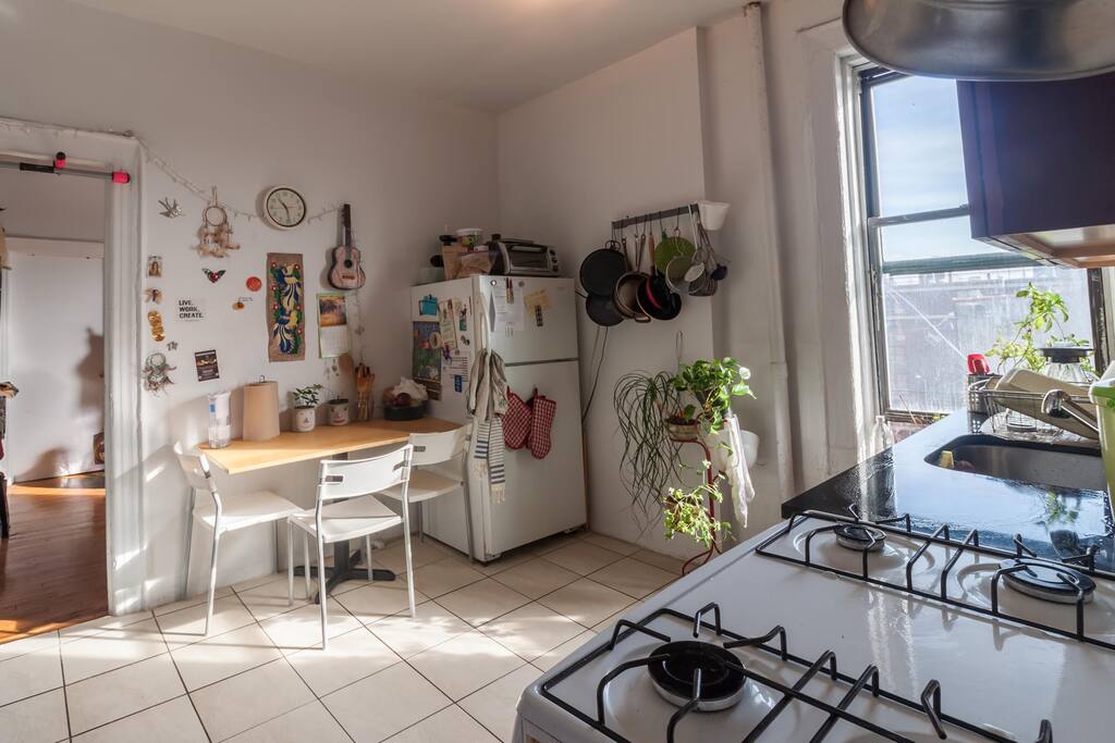 Sunny, cozy, and fully equipped kitchen! Mmm...