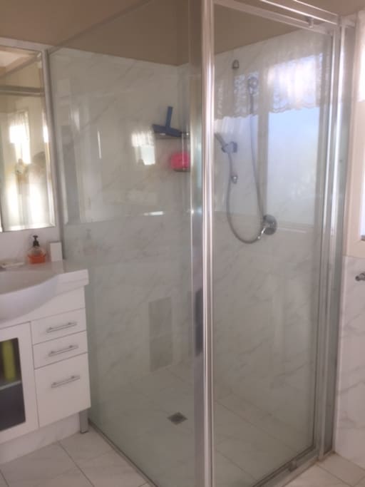 Shared bathroom shower and wash basin