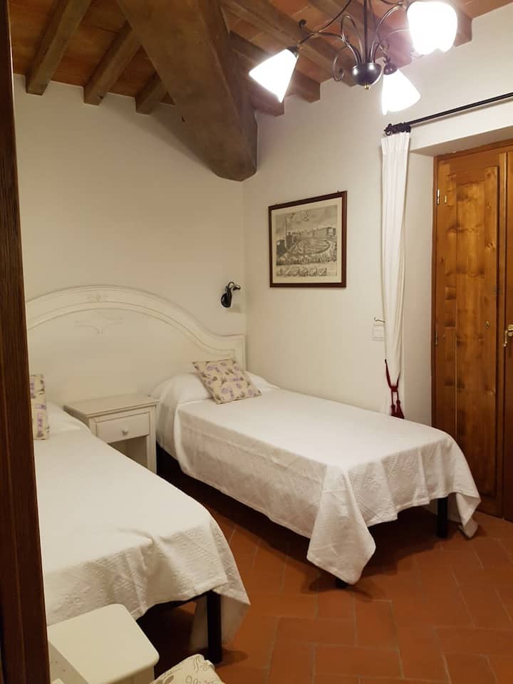 Single beds join to create a queen size bed