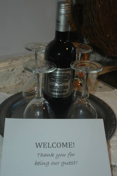 A bottle of wine and glasses await your arrival.