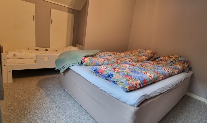 Bedroom 2, furnished with 150 cm bed and junior bed.