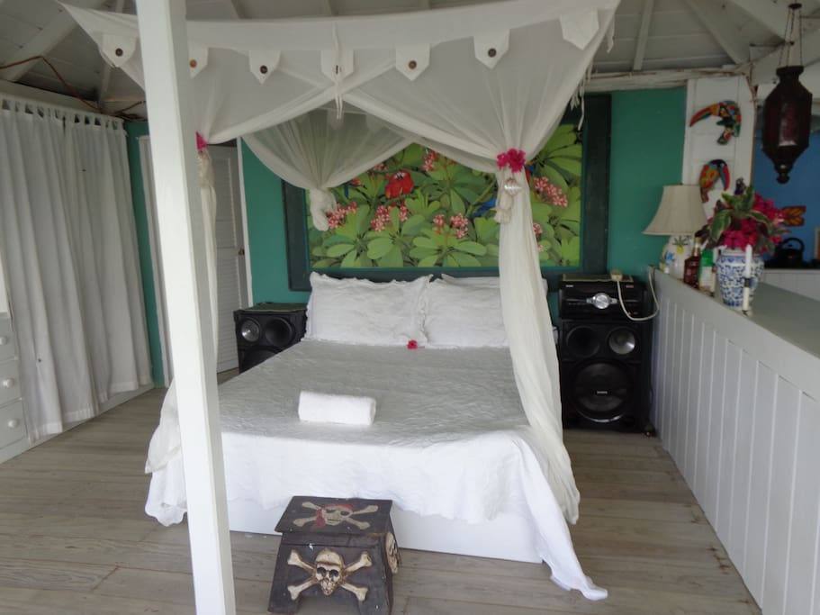 Located in an alcove with a mosquito net