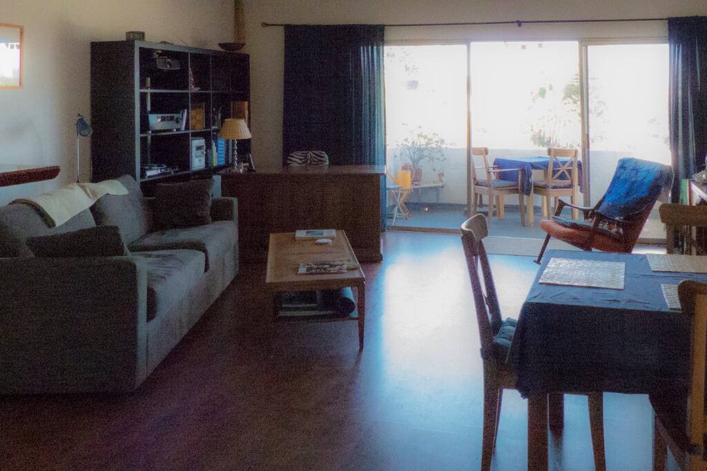 living room, balcony, dining table, work desk, video projector with surround sound to watch movies