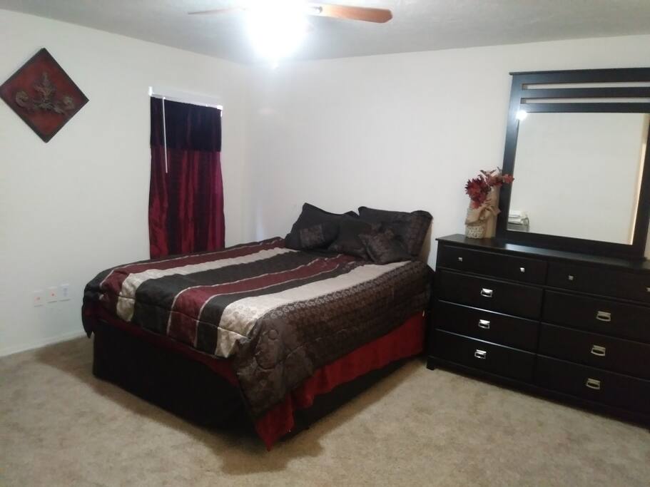 Master bedroom with queen bed