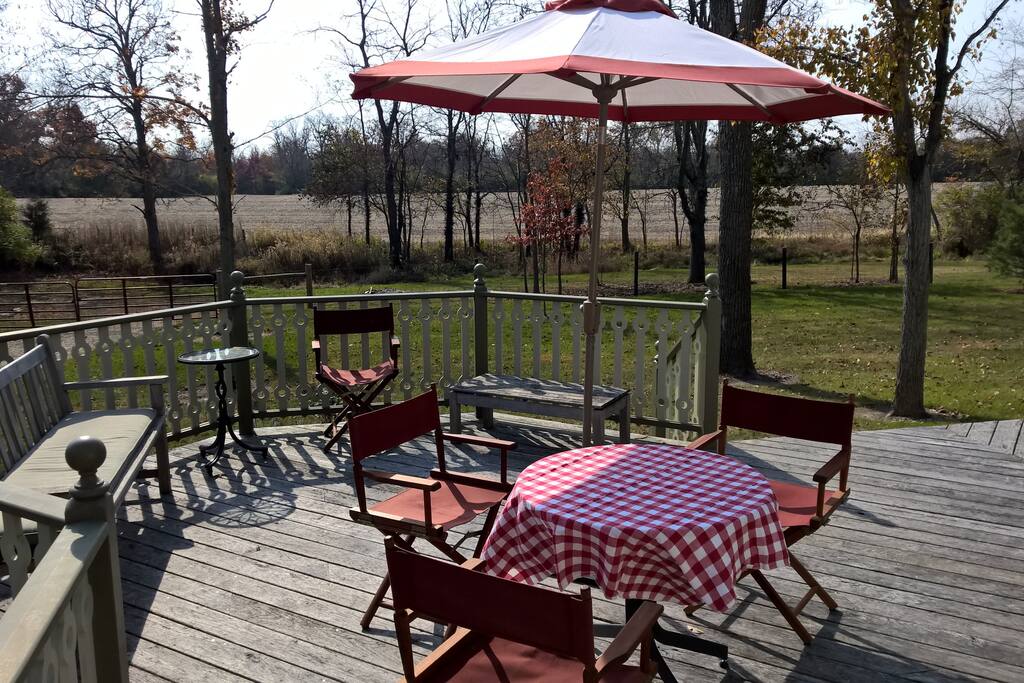 Deck and view across field behind the house.