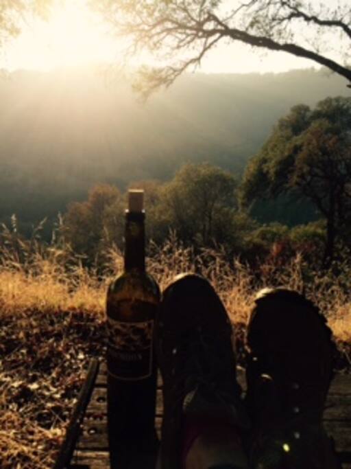 Kicking up my hiking boots. Enjoying wine.