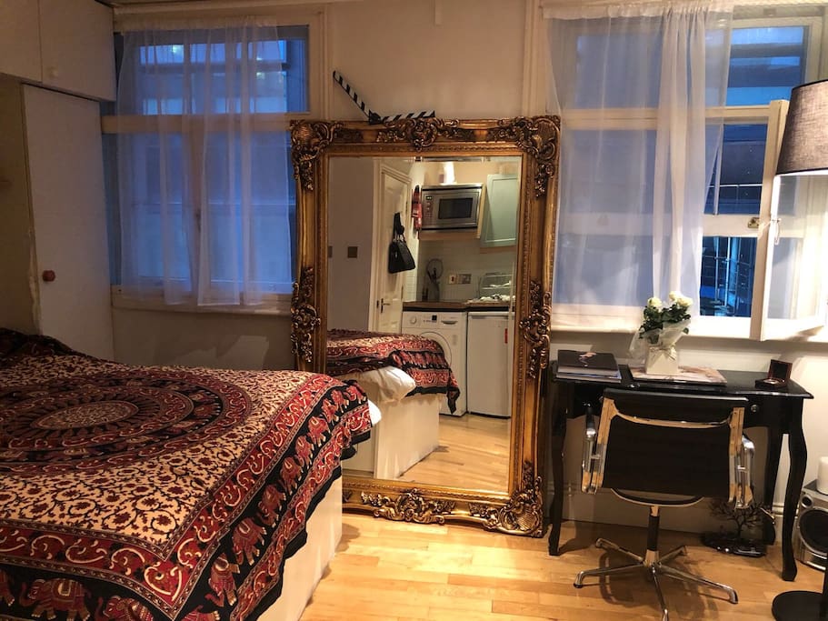 large mirror/ work desk/ double bed