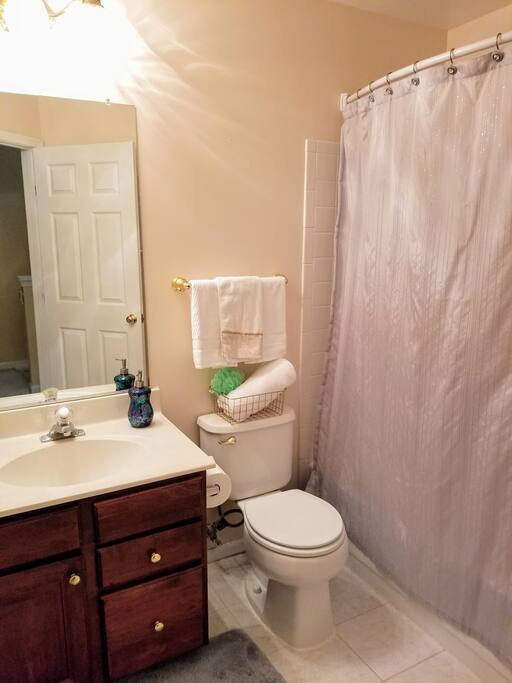 Your private full bath with complimentary towels, shampoo, conditioner, body wash shaving cream, and toothpaste.