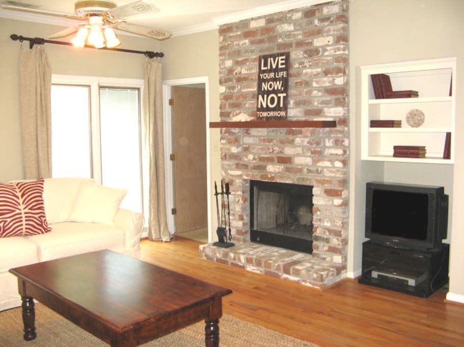 Large great room with comfortable living area and TV with DVD player