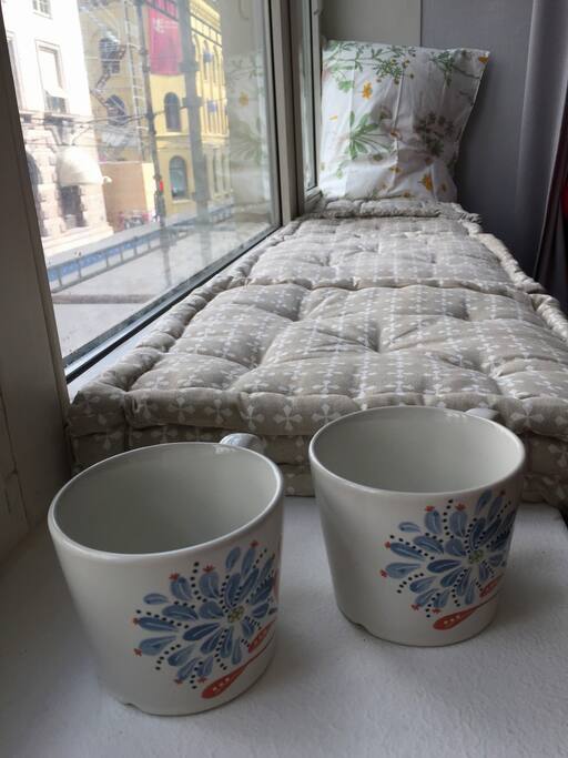 Enjoy a morning coffee vy the window,