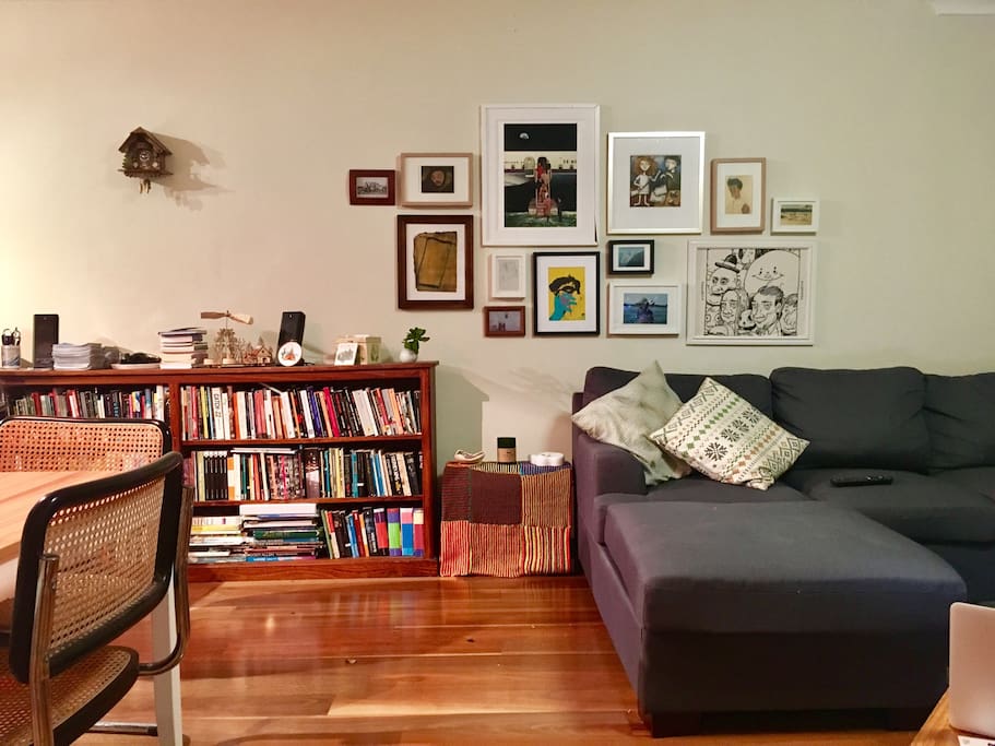 Living room with books galore.