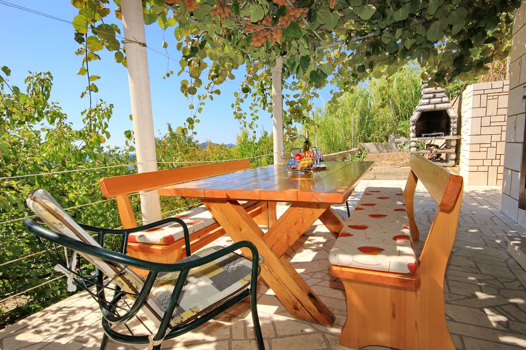 Terrace, table and barbecue